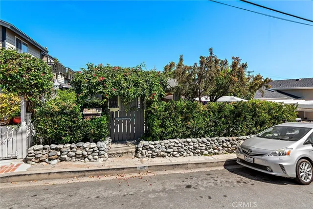 a view of a car parked on the side of the road