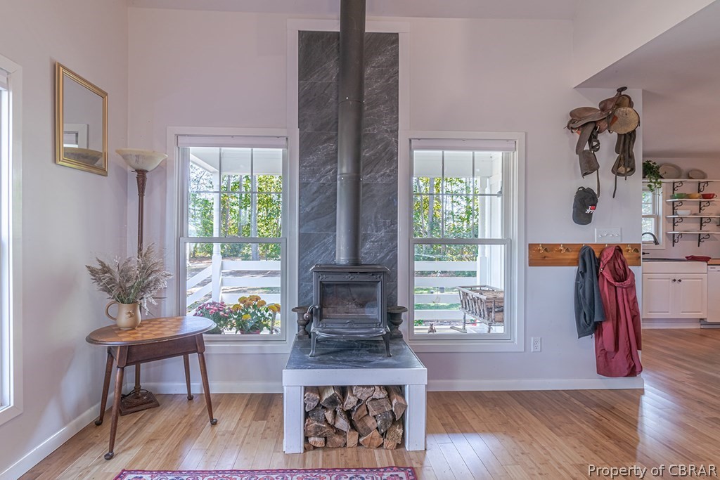 20 Flagstaff Road Lancaster, VA 22503 - Photo 8 of 49 Living Room with wood stove