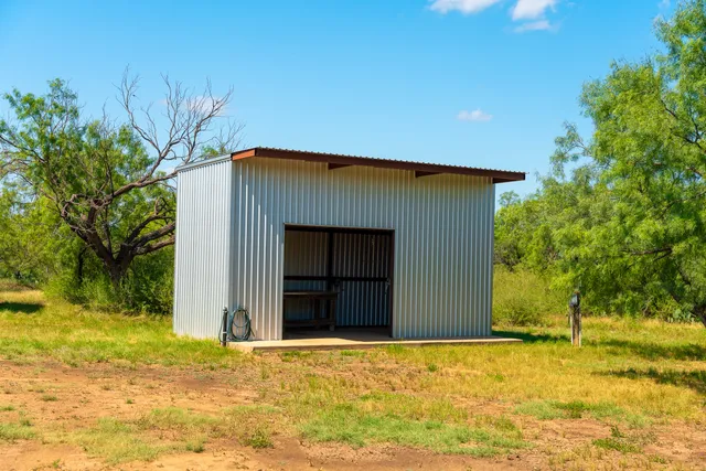 an aerial view of a city and ocean view