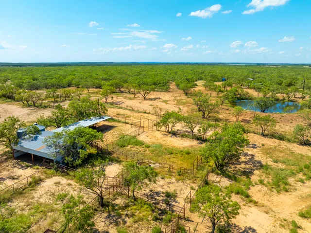 a view of swimming pool with chairs