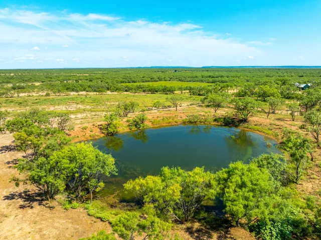 a view of lake with mountain