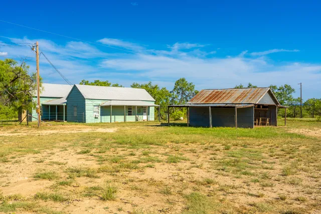 a view of house with outdoor space