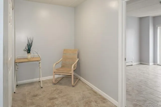 a view of a room with table and chair