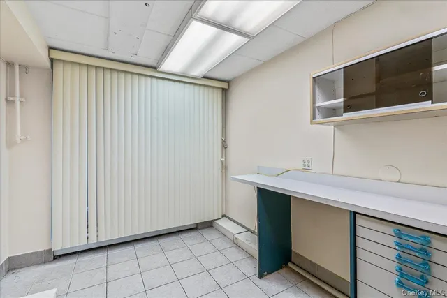 a view of cabinets and wooden floor