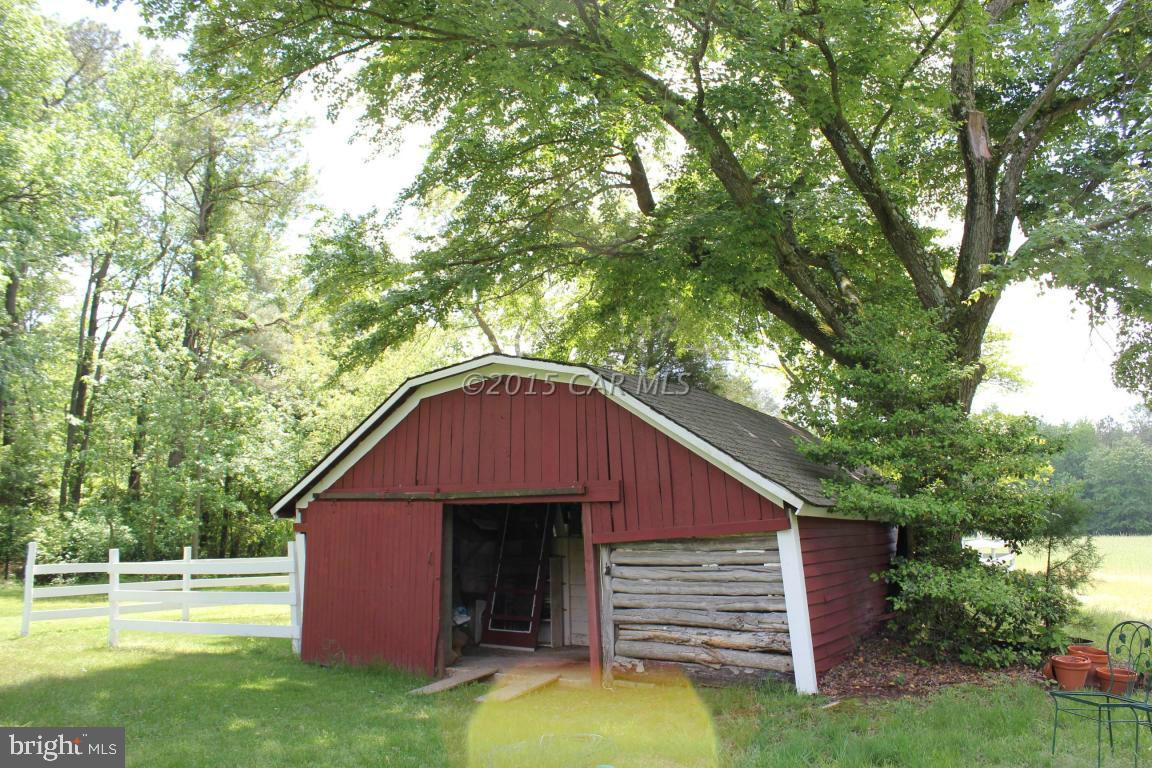 8579 Riggin Road Mardela Springs, MD 21837 - Photo 18 of 45 a view of a house with a yard