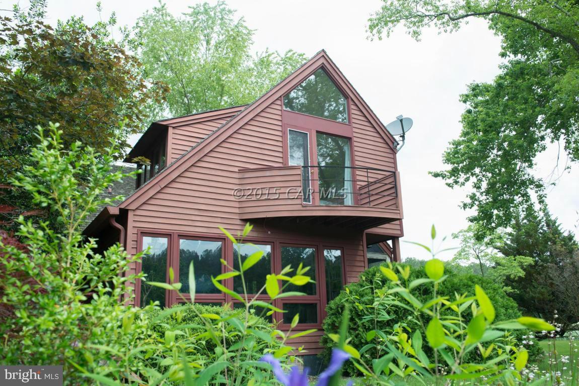 8579 Riggin Road Mardela Springs, MD 21837 - Photo 33 of 45 a front view of a house with garden