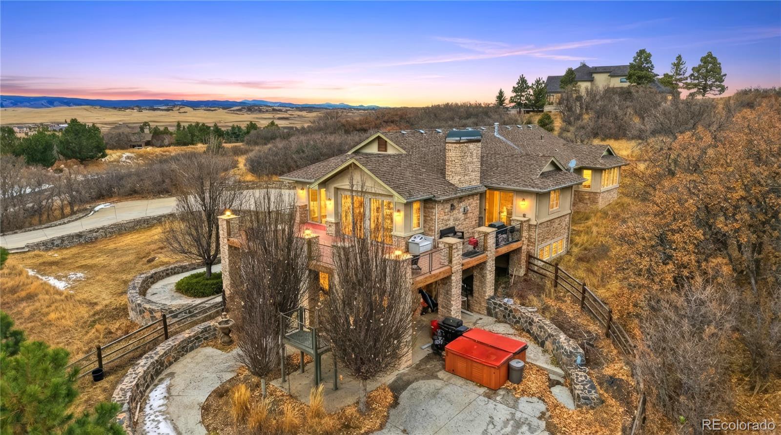 1283 Glade Gulch Road Castle Rock, CO 80104 - Photo 1 of 1 a view of a houses with a city from a balcony