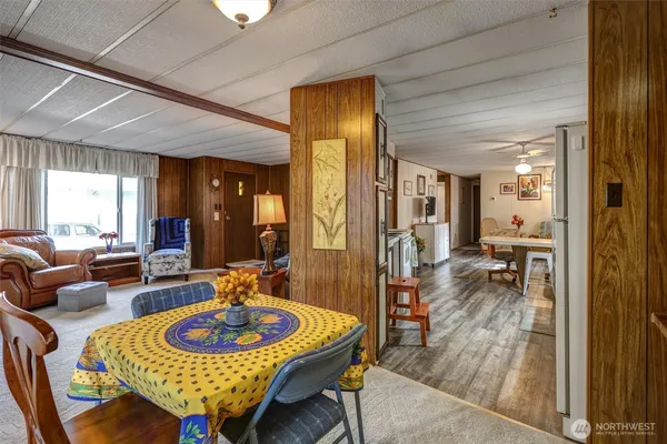 a living room with furniture and a table