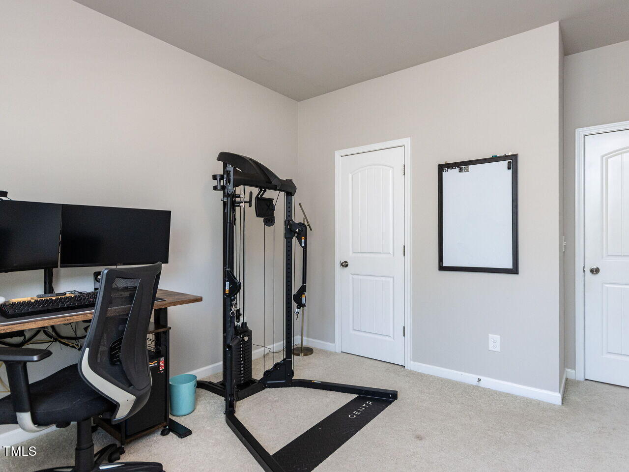 6341 Grace Lily Drive Raleigh, NC 27607 - Photo 23 of 29 a view of a room with gym equipment