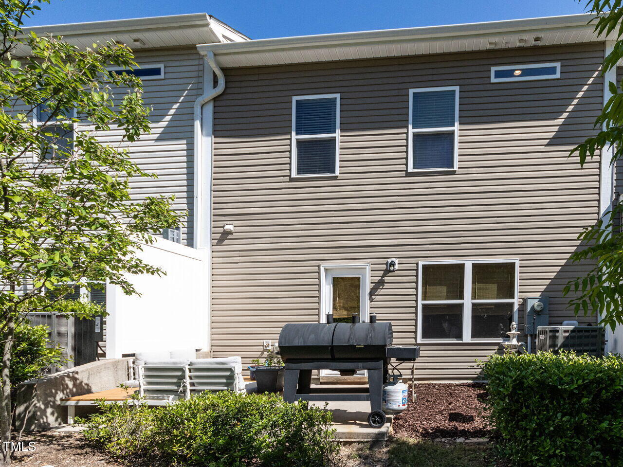 6341 Grace Lily Drive Raleigh, NC 27607 - Photo 29 of 29 a house view with a outdoor space