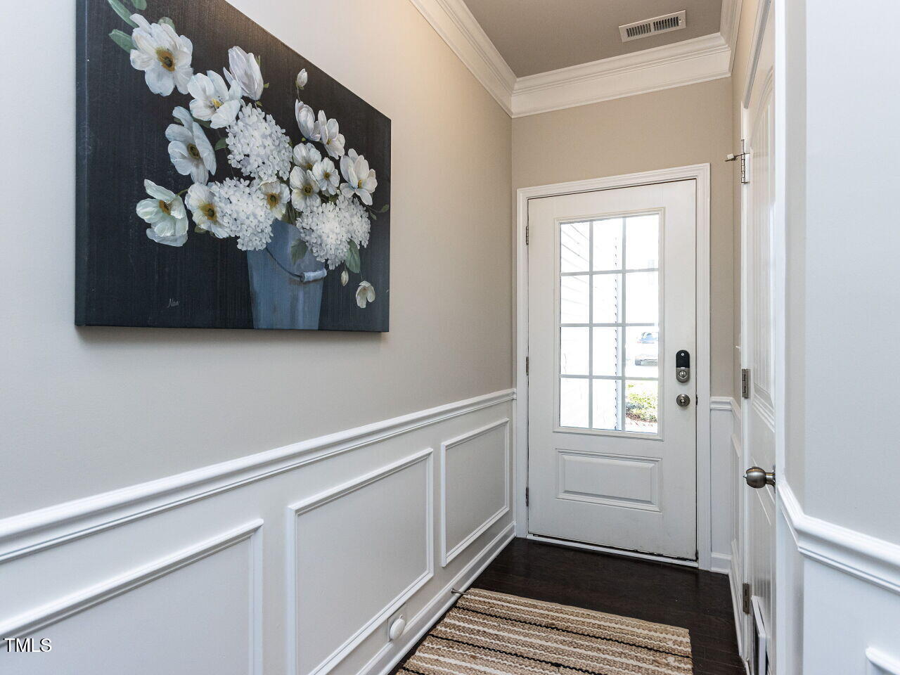 6341 Grace Lily Drive Raleigh, NC 27607 - Photo 4 of 29 a bathroom with a sink and a mirror