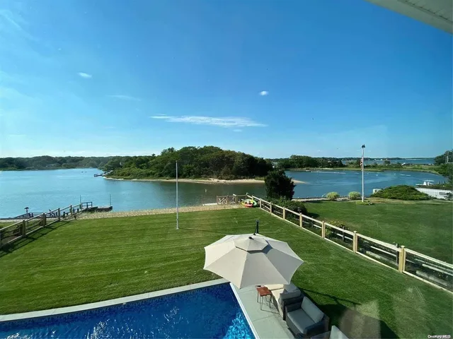 a view of a lake with a garden