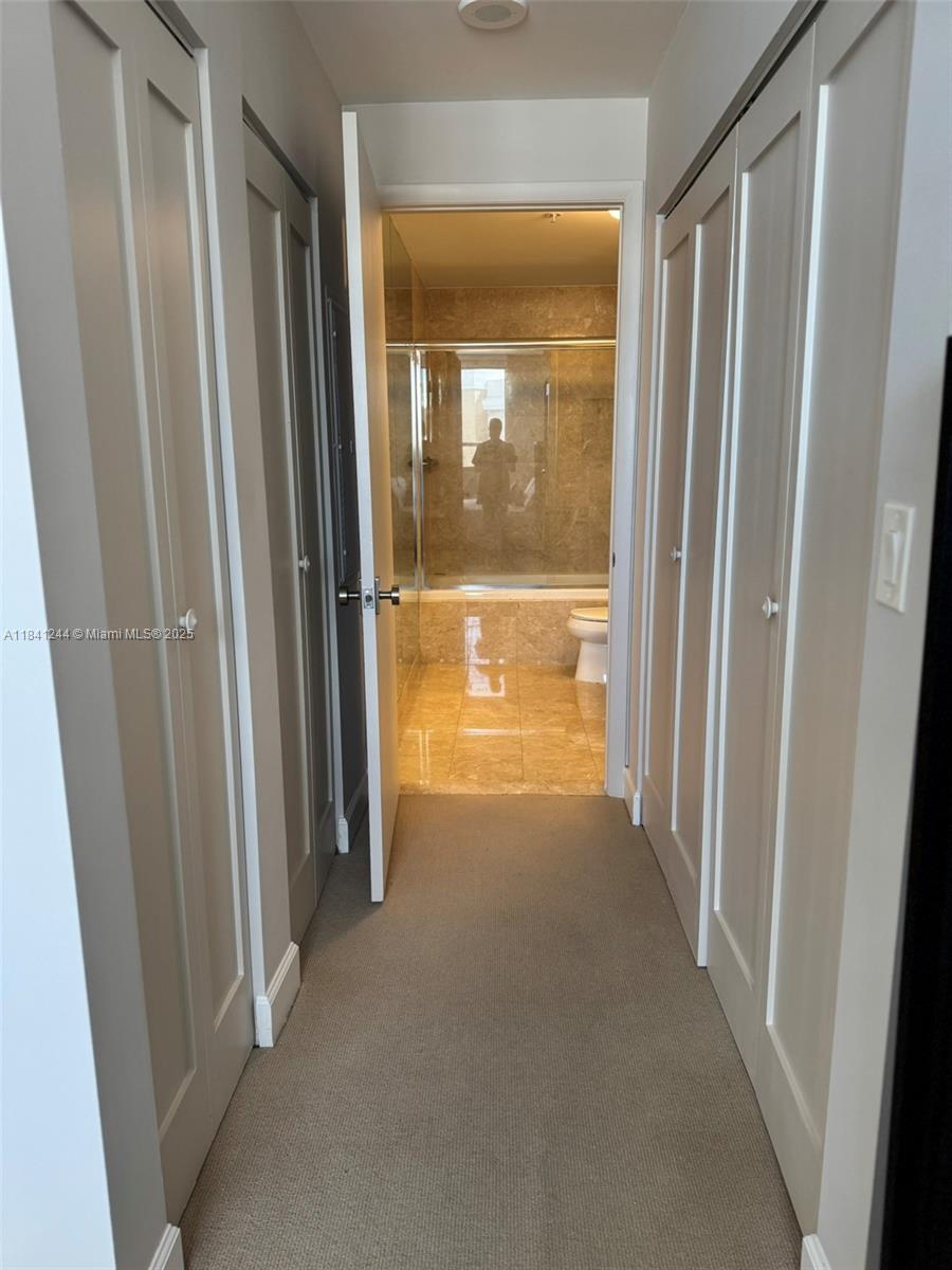 801 Brickell Key Boulevard, Unit 2705 Miami, FL 33131 - Photo 13 of 14 a view of a glass door with a door