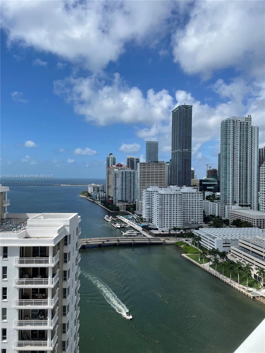 801 Brickell Key Boulevard, Unit 2705 Miami, FL 33131 - Photo 10 of 14 a view of a city with tall buildings