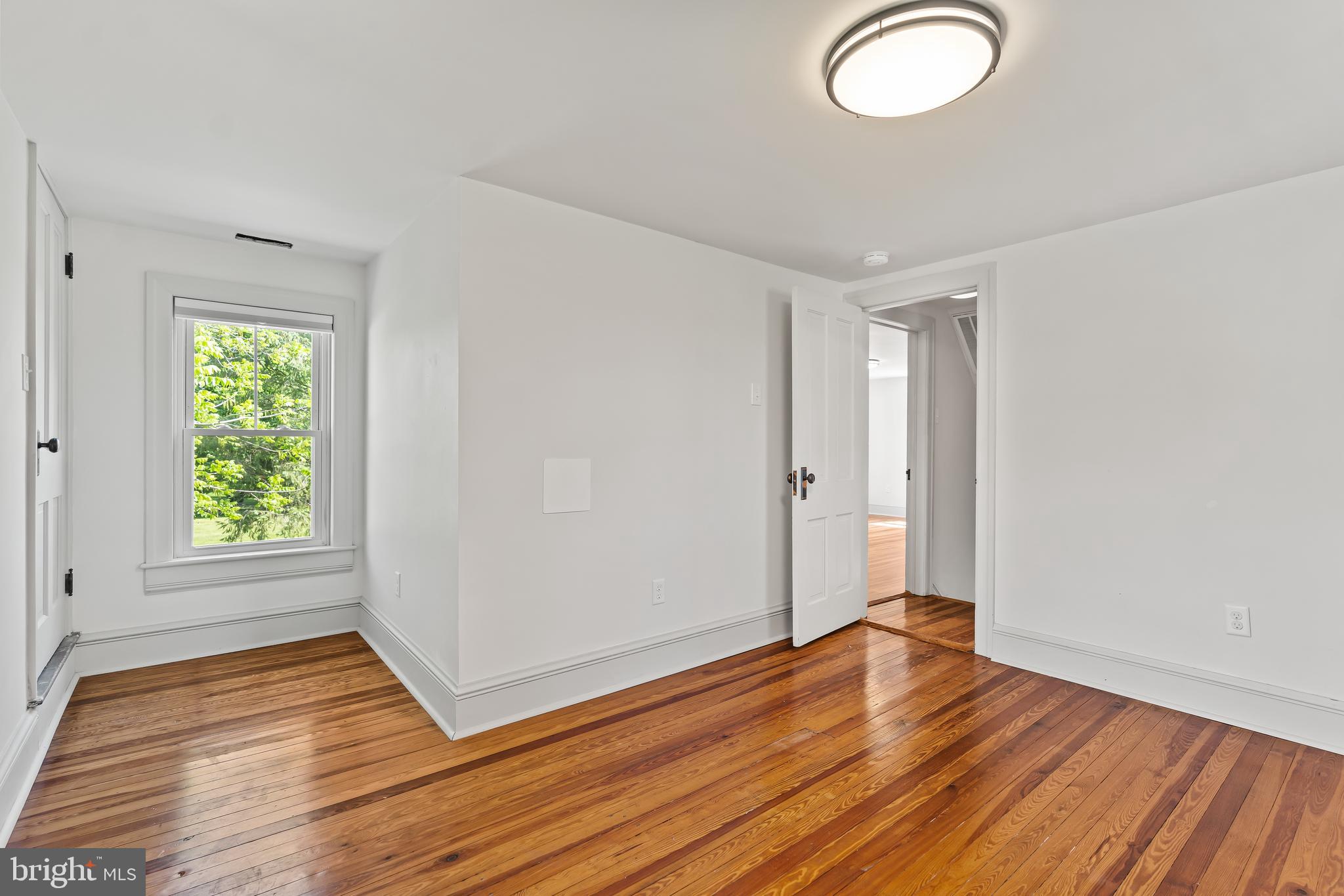14005 Dry Run Road Clear Spring, MD 21722 - Photo 36 of 44 a view of a room with wooden floor and window
