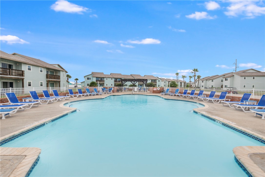 230 Cut-Off Road, Unit 101 Port Aransas, TX 78373 - Photo 25 of 30 a city view with tall buildings