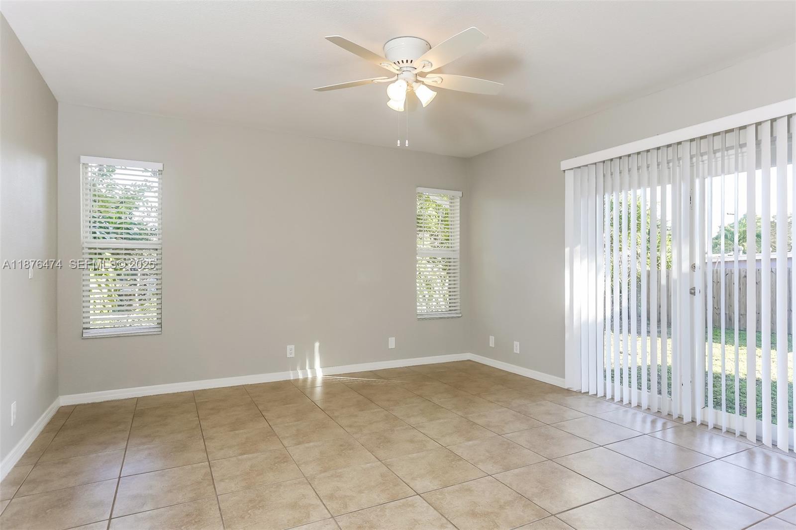 5819 Wilson Street Hollywood, FL 33021 - Photo 8 of 16 a view of an empty room with a window