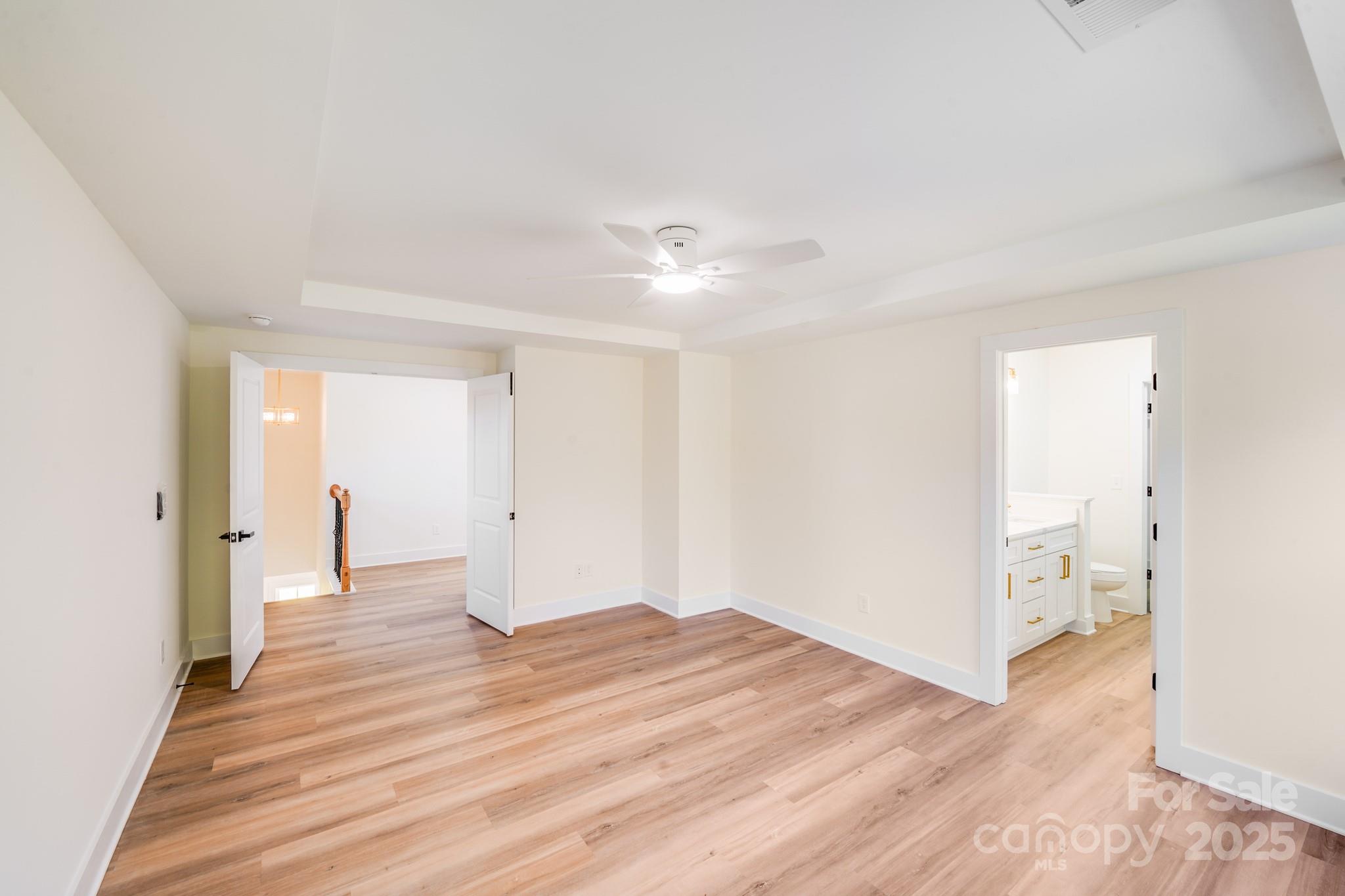 4538 Orphanage Road Concord, NC 28027 - Photo 7 of 14 wooden floor in an empty room with a window
