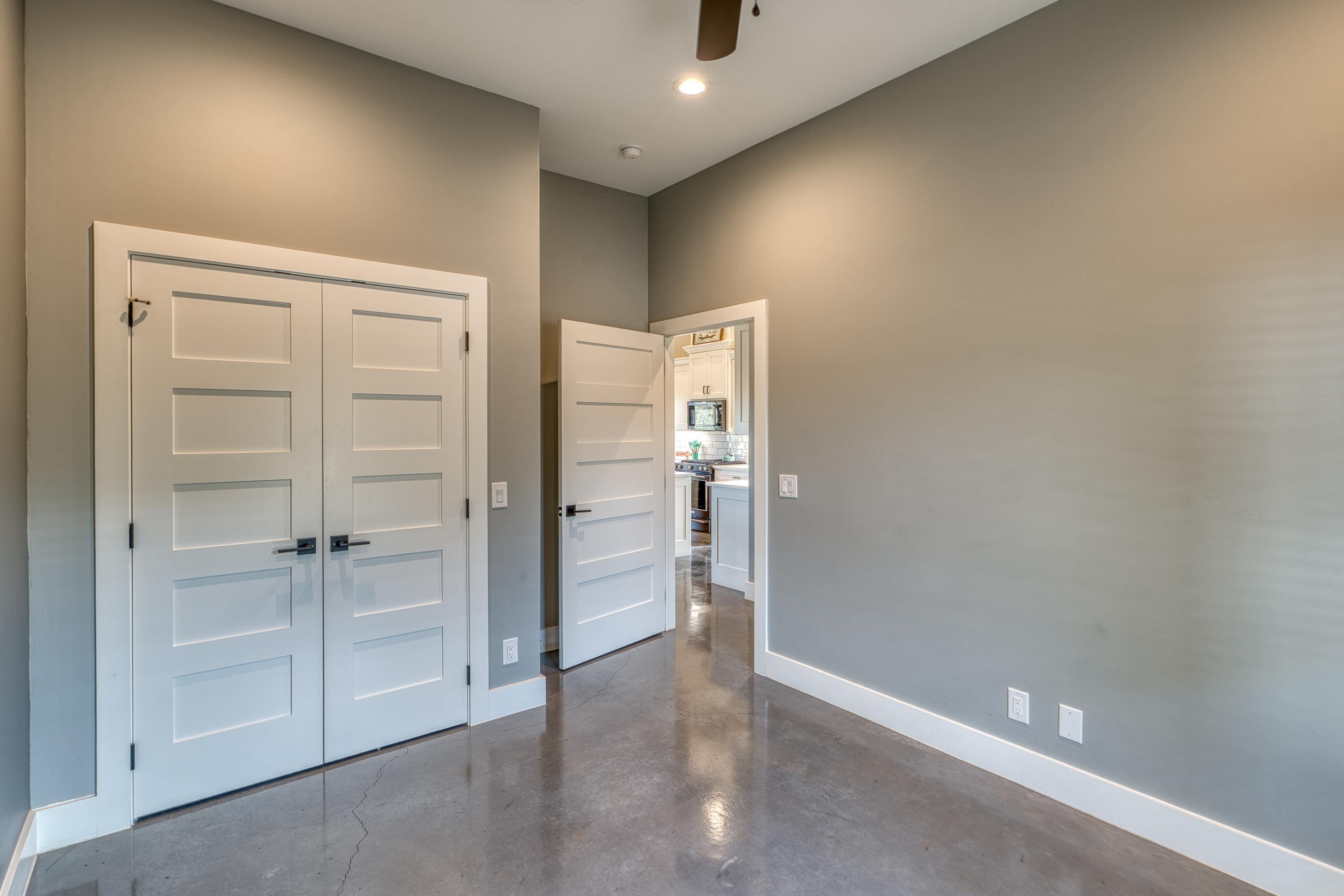 105 Keystone Buchanan Dam, TX 78609 - Photo 11 of 30 an empty room with cabinet and gate