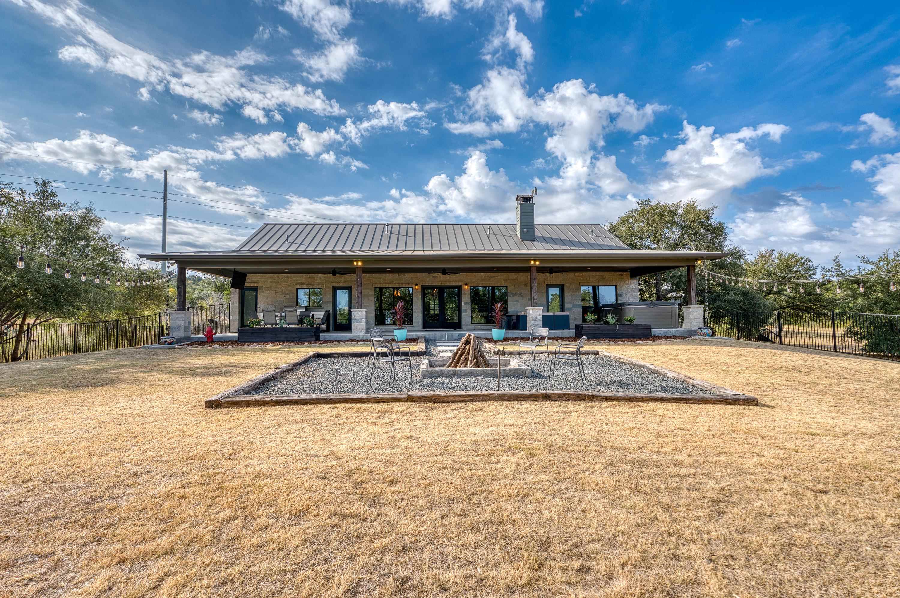 105 Keystone Buchanan Dam, TX 78609 - Photo 21 of 30 a view of house with swimming pool and sitting area