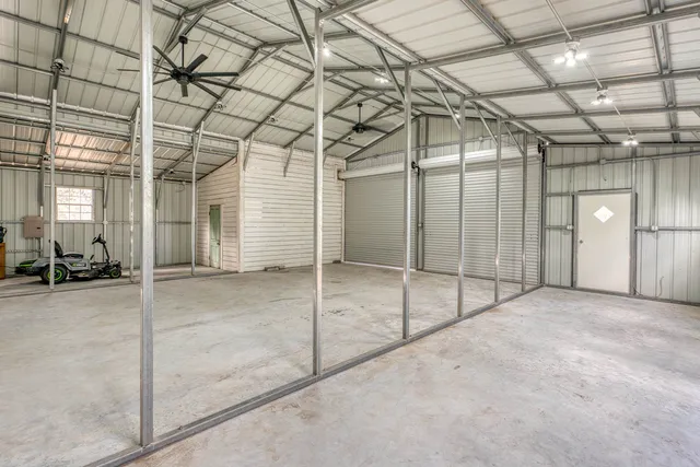 a house view with a seating space and garden