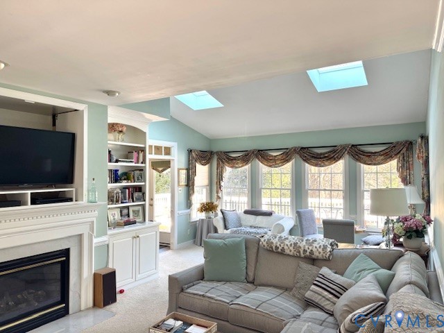 14307 Abbots Ridge Court Midlothian, VA 23113 - Photo 2 of 16 a living room with furniture a flat screen tv and a large window