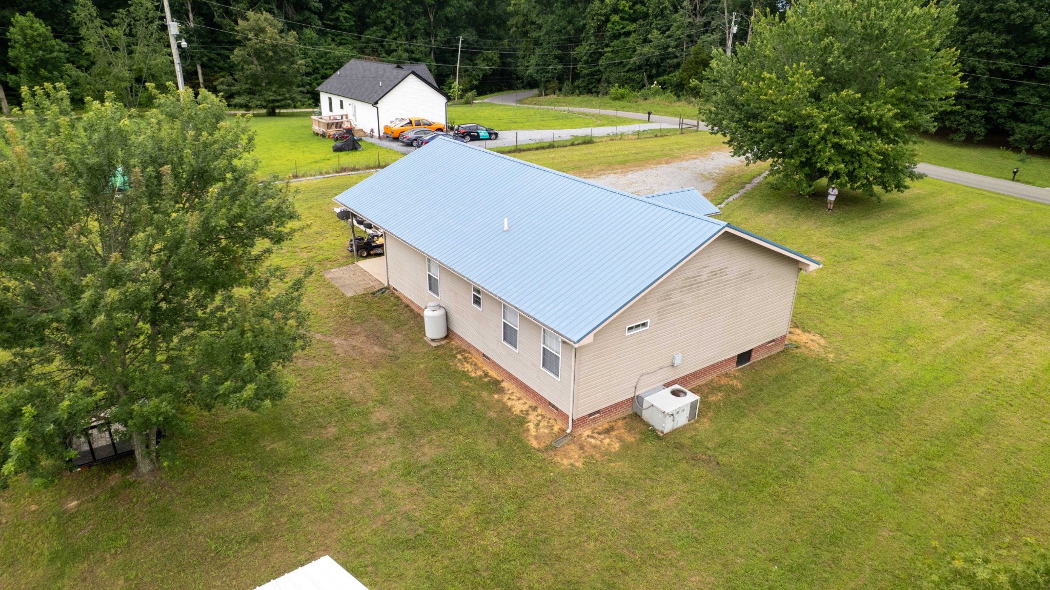 618 Lear Road Portland, TN 37148 - Photo 29 of 29 an aerial view of a house with swimming pool and large trees