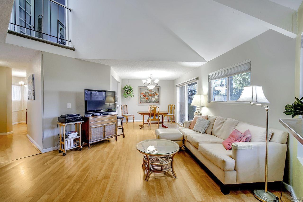 618 Racquet Club Circle Rohnert Park, CA 94928 - Photo 1 of 1 a living room with furniture and a flat screen tv
