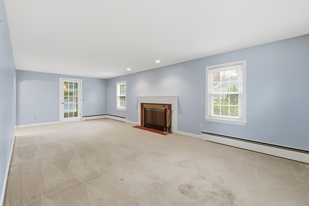 15 Lowell Avenue Holden, MA 01520 - Photo 22 of 42 a view of empty room with a fireplace