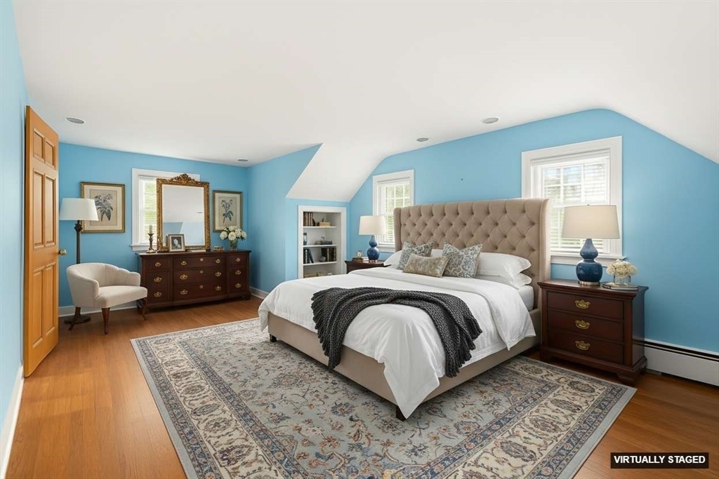 15 Lowell Avenue Holden, MA 01520 - Photo 4 of 42 a bedroom with a bed and a couch