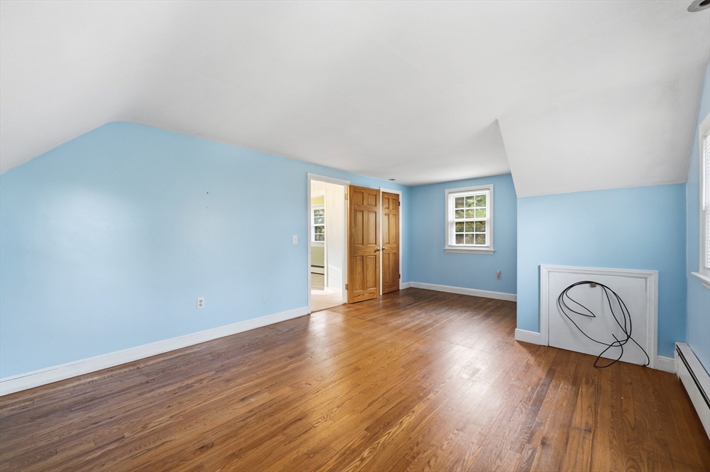15 Lowell Avenue Holden, MA 01520 - Photo 7 of 42 a view of a livingroom with wooden floor and window