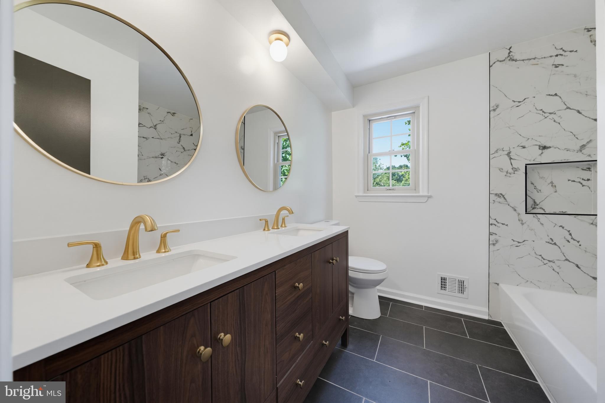 14908 Notley Road Silver Spring, MD 20905 - Photo 19 of 50 Dual Vanity Hallway Bathroom