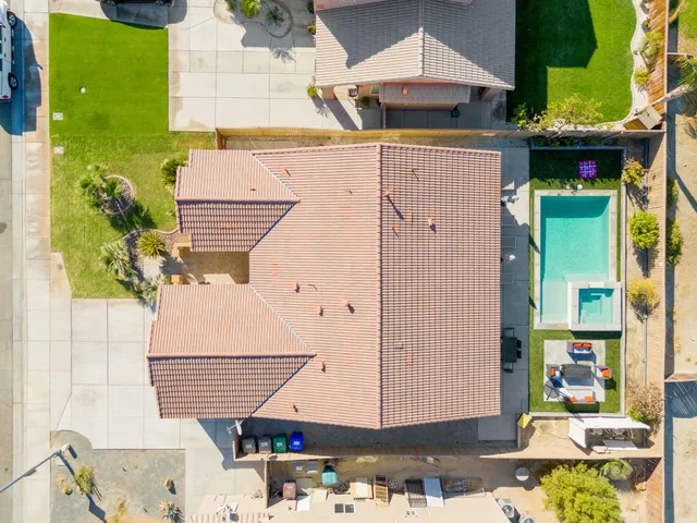 a aerial view of a house with a yard