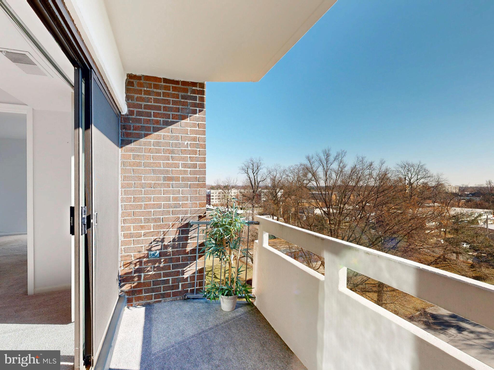7 Slade Avenue, Unit 718 Pikesville, MD 21208 - Photo 19 of 58 a view of balcony with furniture