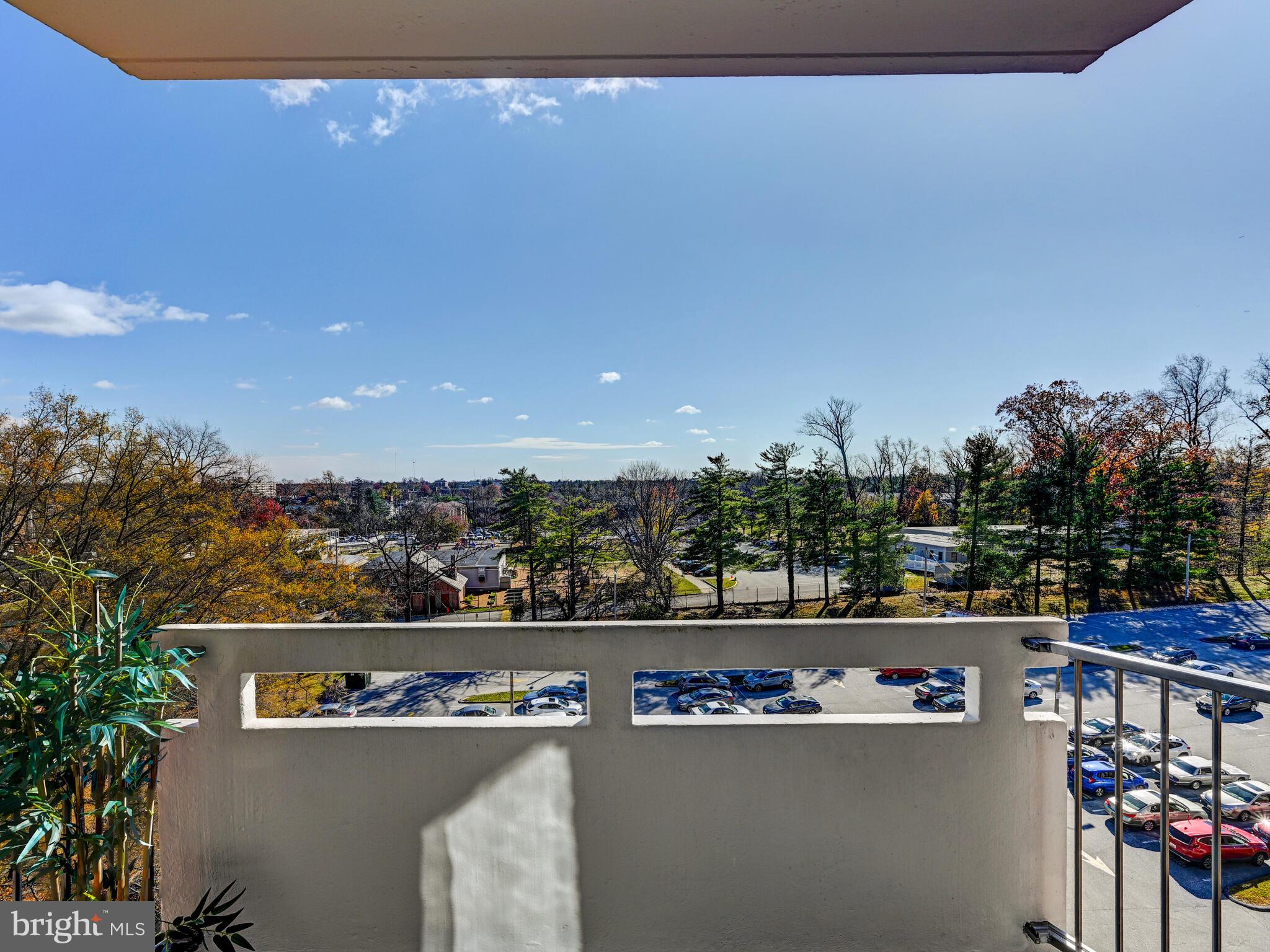 7 Slade Avenue, Unit 718 Pikesville, MD 21208 - Photo 20 of 58 a view of a lake with a city view