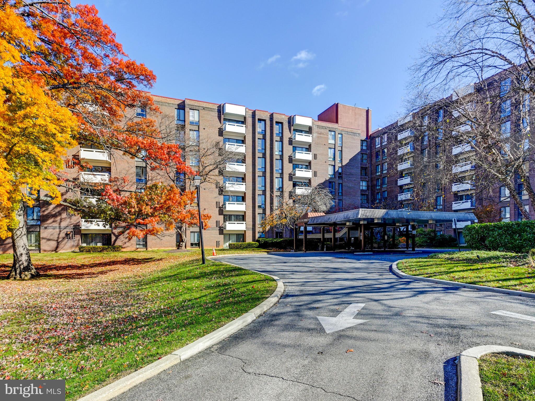 7 Slade Avenue, Unit 718 Pikesville, MD 21208 - Photo 24 of 58 a view of a city with tall buildings