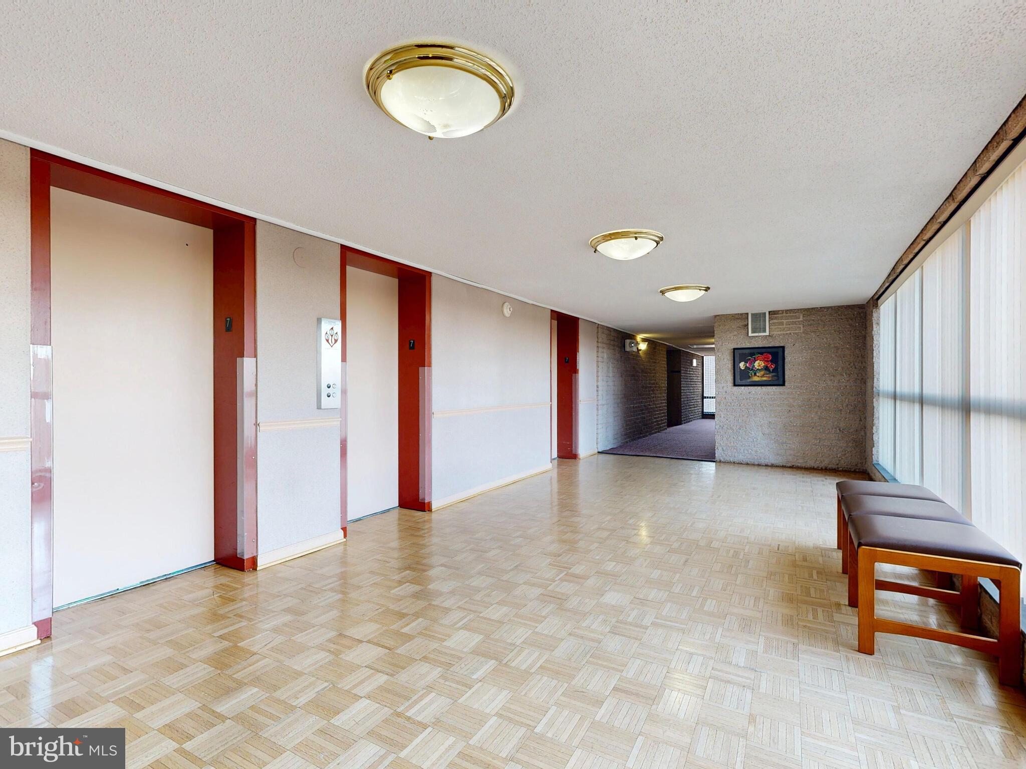 7 Slade Avenue, Unit 718 Pikesville, MD 21208 - Photo 35 of 58 a view of an empty room with a window