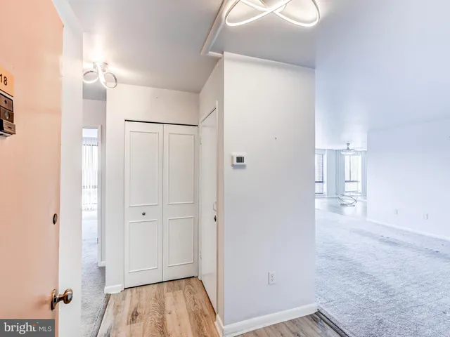 a view of an empty room with a window