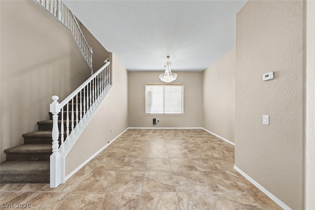 2356 Rue Bienville Way Henderson, NV 89044 - Photo 6 of 20 This versatile space offers potential for an elegant dining area or a bright sitting room.