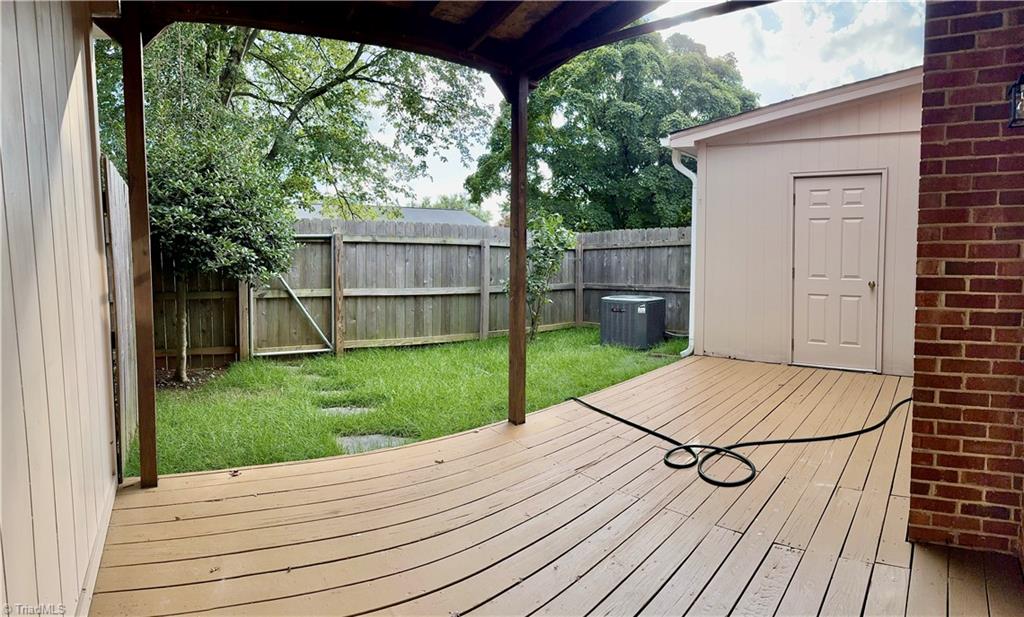 4817 Tower Road, Unit D Greensboro, NC 27410 - Photo 12 of 13 Fenced Patio