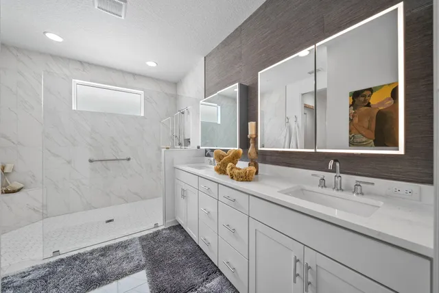 a livingroom with workspace window and a couch