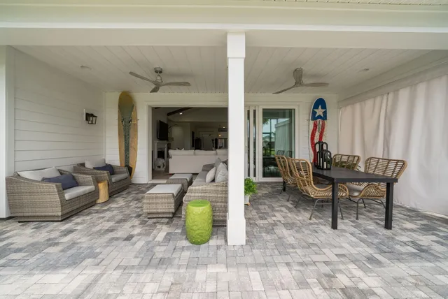 a view of swimming pool with outdoor seating