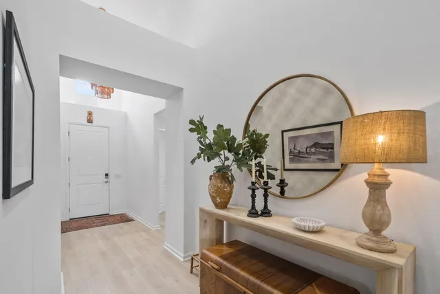 a kitchen with a sink appliances and a counter top space