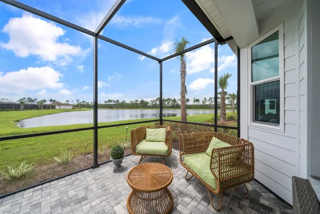 a view of a golf course with a lake