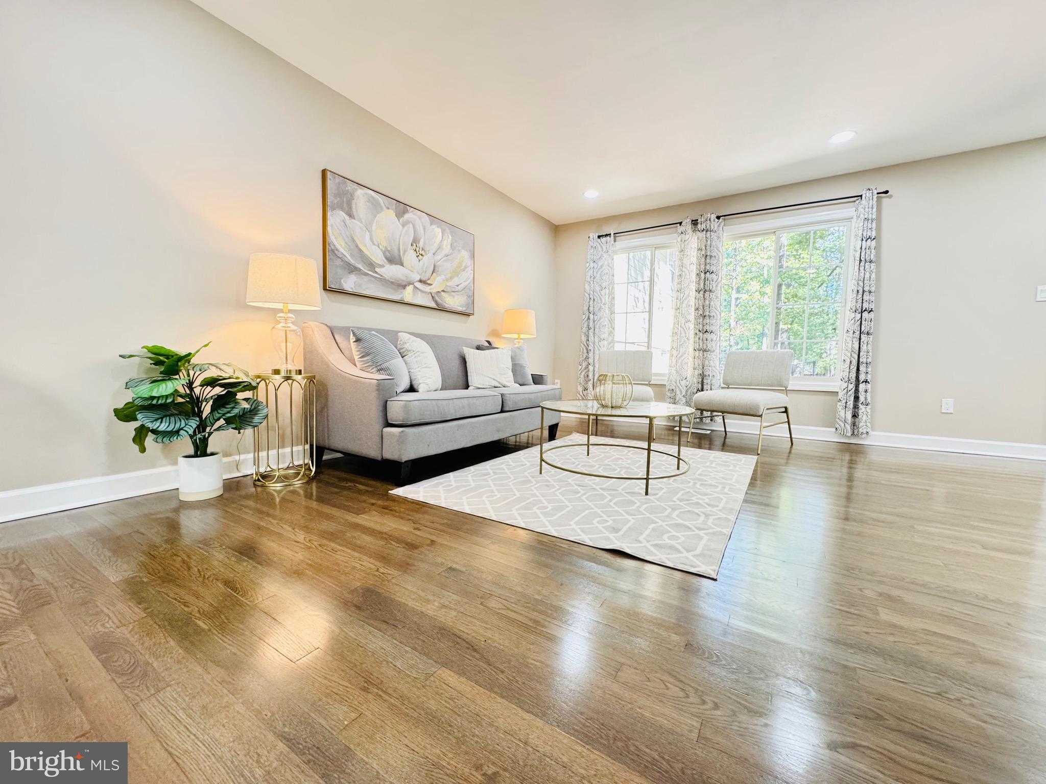 12306 Dendron Place Fort Washington, MD 20744 - Photo 15 of 48 a living room with furniture and wooden floor