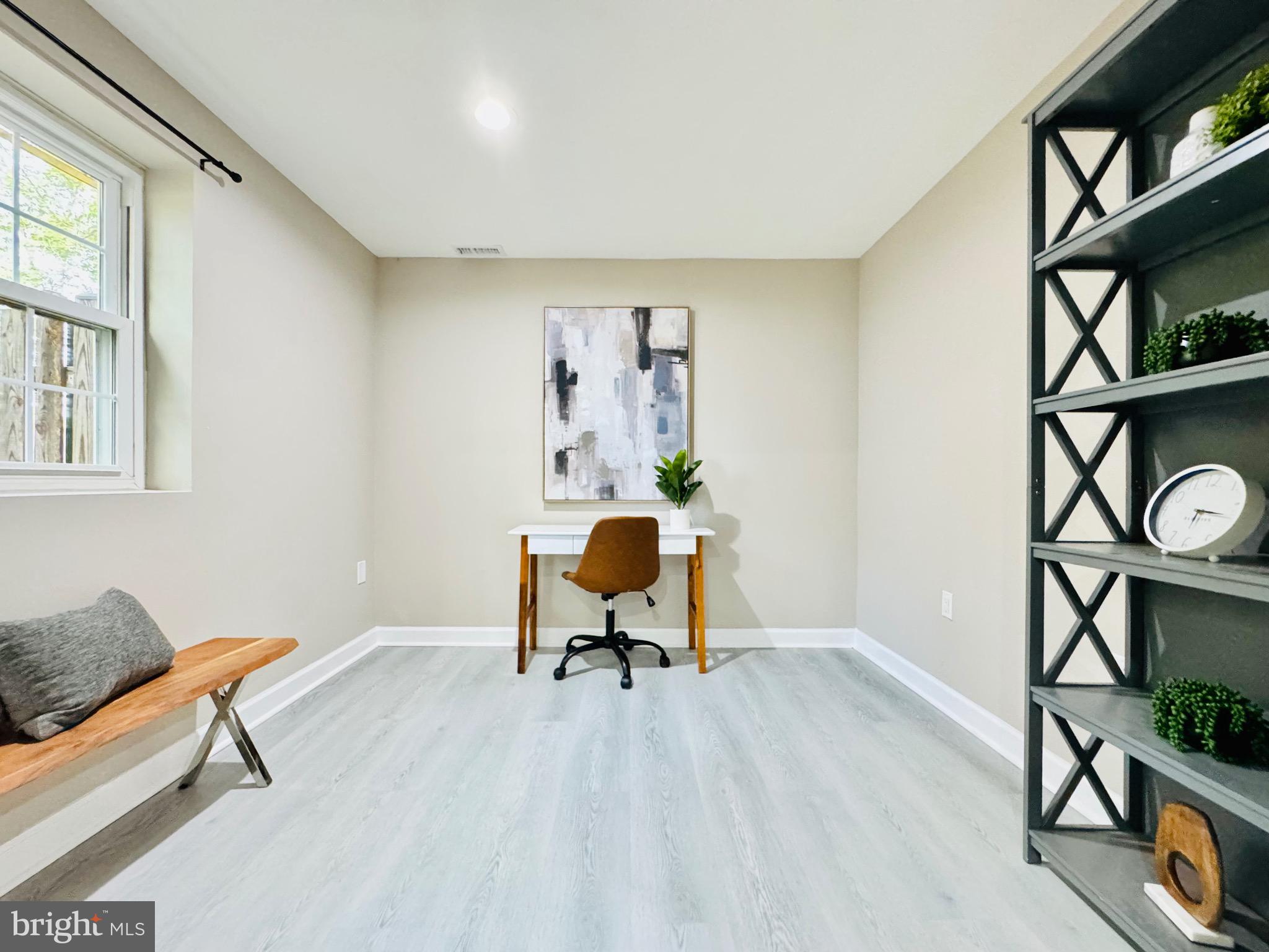 12306 Dendron Place Fort Washington, MD 20744 - Photo 18 of 48 a living room with furniture and a window