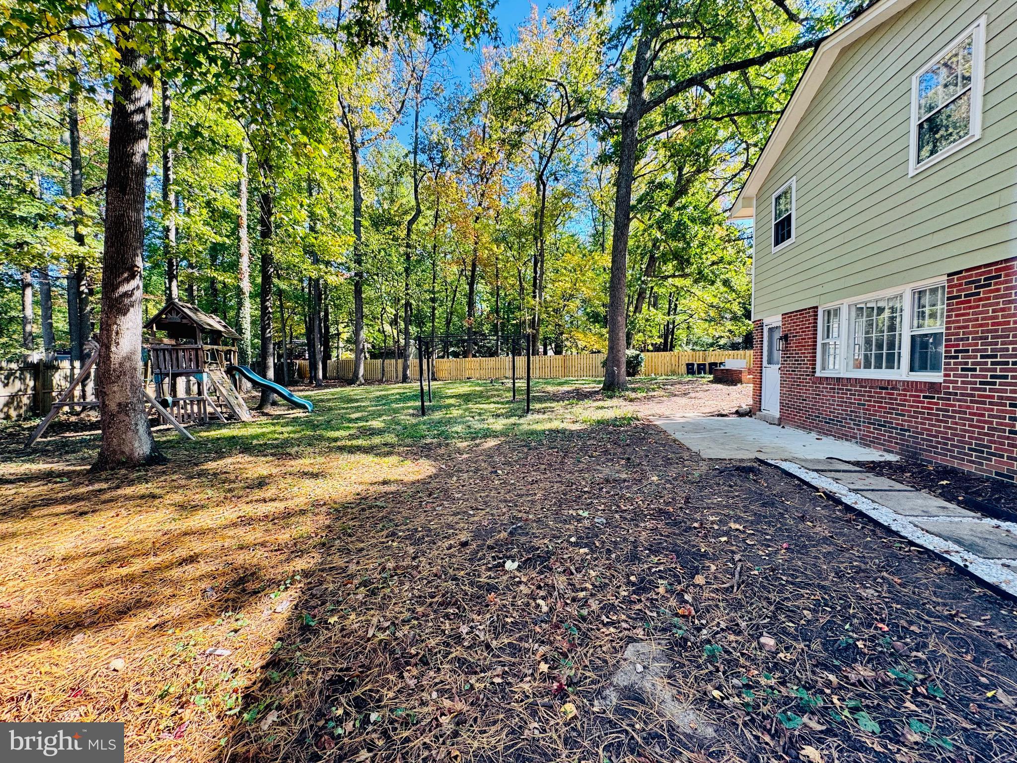 12306 Dendron Place Fort Washington, MD 20744 - Photo 42 of 48 a view of a house with backyard and trees