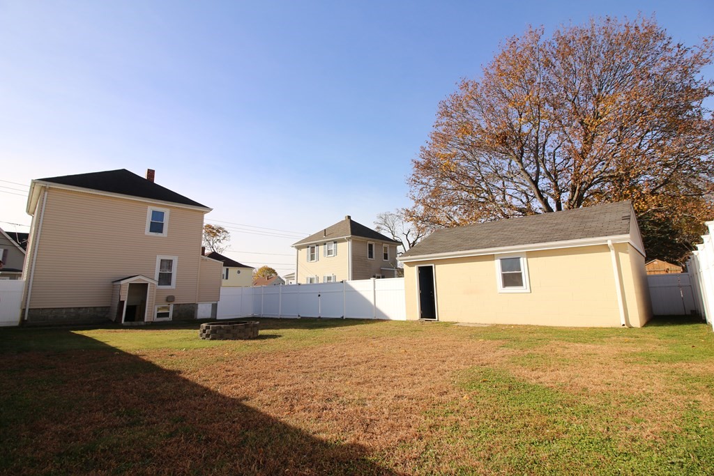 218 Lawton Street Fall River, MA 02721 - Photo 4 of 28 a house view with a backyard space