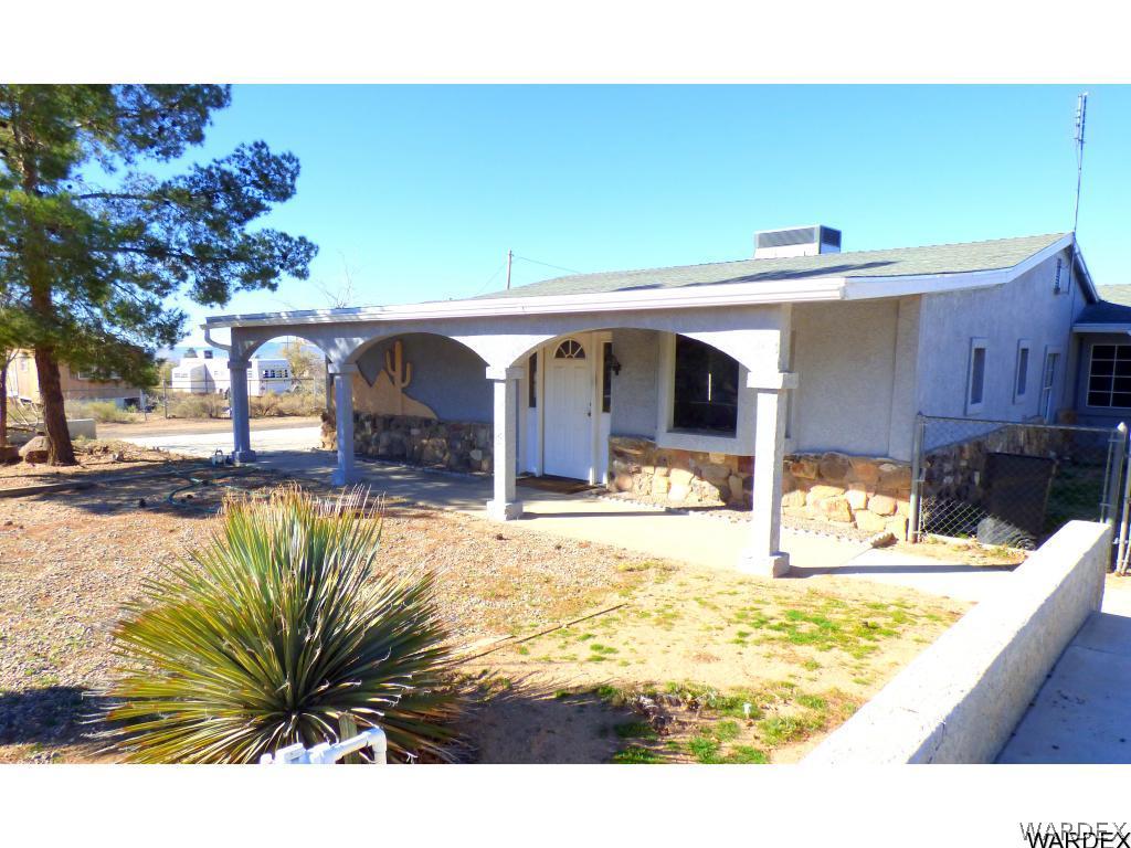 3715 Bosque Road Golden Valley, AZ 86413 - Photo 2 of 36 a view of a swimming pool with an outdoor space