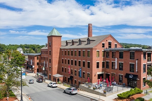 a front view of a building with street view